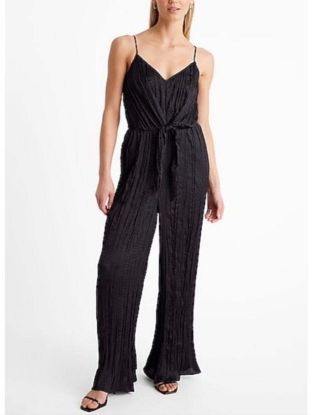 Excellent elegant black crinkle jumpsuit with thin straps and a V-neckline
